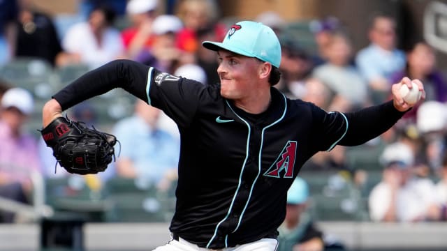 Arizona Diamondbacks left-hander Tommy Henry (32) pitches against the Kansas City Royals at Salt River Fields on March 14, 2024.